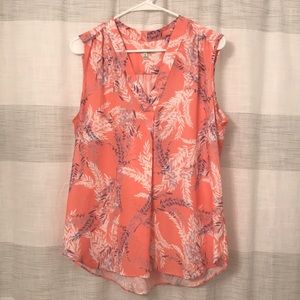 Orange & white sleeveless v neck blouse